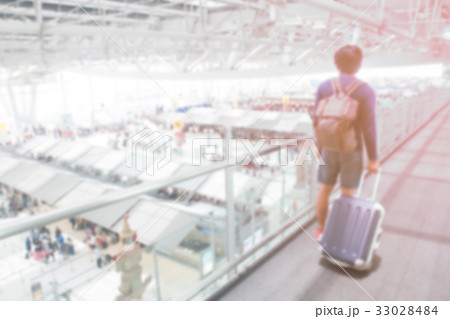 Abstract blur airport interior with traveler  33028484