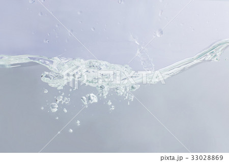 Blue wave and bubbles of clean water. 33028869