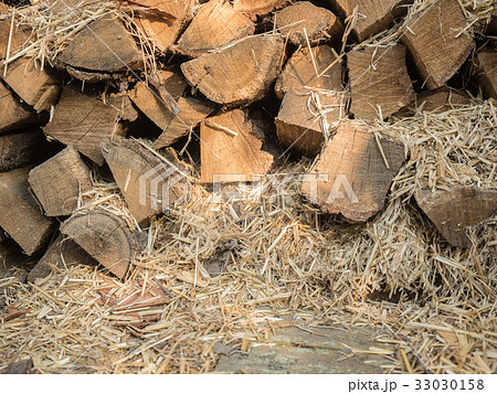 The fuel wood stacked on top of each other mixed The fuel wood stacked on top of each other mixed 33030158