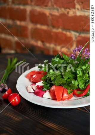 Fresh salad of tomatoes, cucumbers, peppers Fresh salad of tomatoes, cucumbers, peppers 33032887
