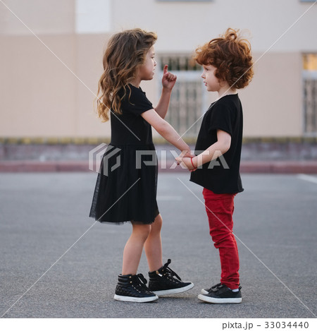 cute little girl edifies boy 33034440