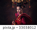 Asian woman in Chinese tradition dress 33038012