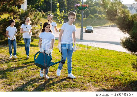 Delighted children doing their tasks Delighted children doing their tasks 33040357