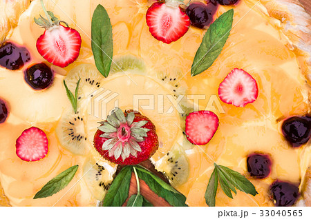Fruit pizza with strawberries kiwi pineapple Fruit pizza with strawberries kiwi pineapple 33040565