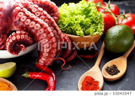 Freshly prepared octopus with vegetables & spices Freshly prepared octopus with vegetables & spices 33042047
