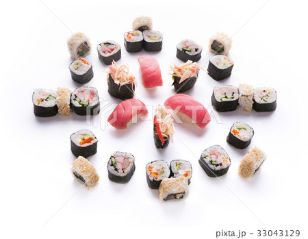 Set of sushi, maki and rolls isolated on white Set of sushi, maki and rolls isolated on white 33043129