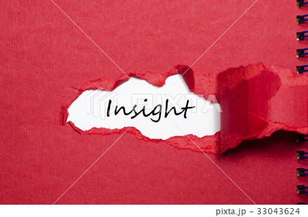 The word insight appearing behind torn paper 33043624