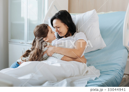 Joyful nice girl spending time with her mother 33044941