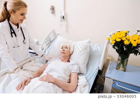 Sweet delicate doctor trying cheering up her 33046005