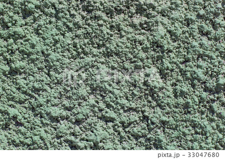 Emerald green painted stucco wall.  33047680