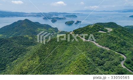 亀老山と来島海峡大橋 愛媛県今治市大島 しまなみ海道 空撮の写真素材