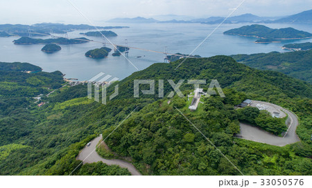 亀老山と来島海峡大橋 愛媛県今治市大島 しまなみ海道 空撮の写真素材