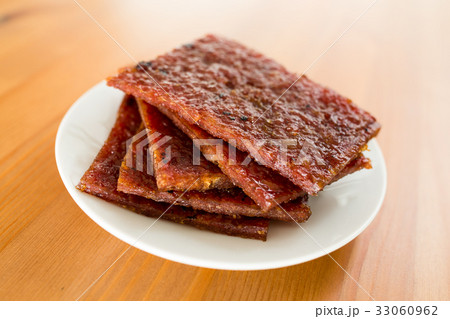 Sliced dried pork on dish Sliced dried pork on dish 33060962