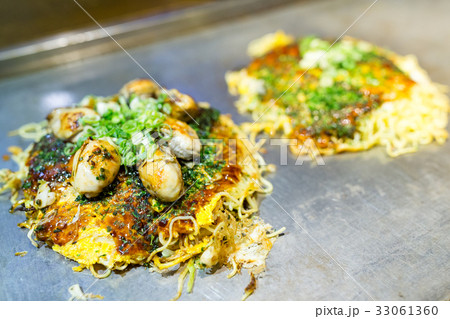 Okonomiyaki Japanese hot plate pizza 33061360