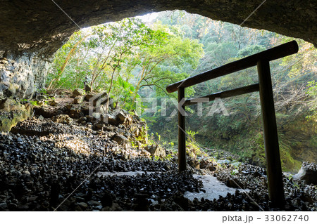 Shinto shrine gateway in the cave 33062740
