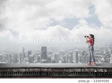 Concept of careless happy childhood with girl of school age look Concept of careless happy childhood with girl of school age look 33064090