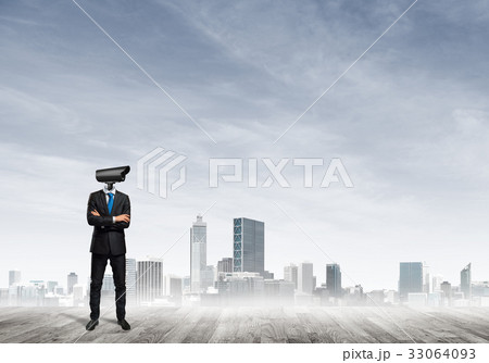 Concept of security and privacy protection with camera headed man 33064093