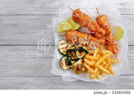 chicken shish kebab with french fries chicken shish kebab with french fries 33064096