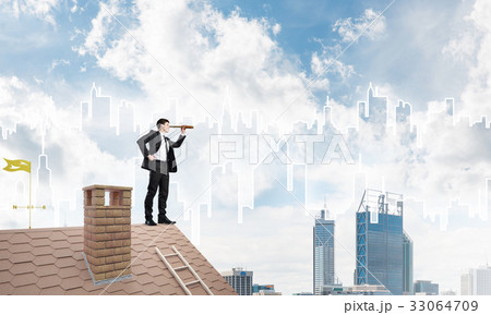 Engineer man standing on roof and looking in spyglass. Mixed media 33064709