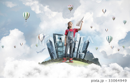 Concept of careless happy childhood with girl dreaming about fut Concept of careless happy childhood with girl dreaming about fut 33064949