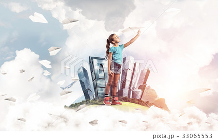 Concept of careless happy childhood with girl dreaming about fut 33065553