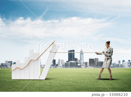 Businesswoman pulling graph with rope as concept of power and control Businesswoman pulling graph with rope as concept of power and control 33066210