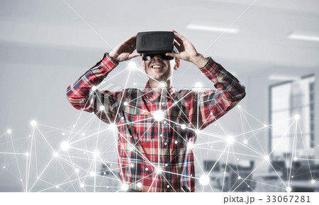Guy wearing checked shirt and virtual mask demonstrating some em Guy wearing checked shirt and virtual mask demonstrating some em 33067281