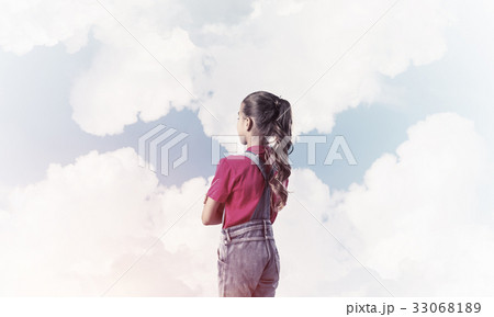 Concept of careless happy childhood with girl looking in future 33068189