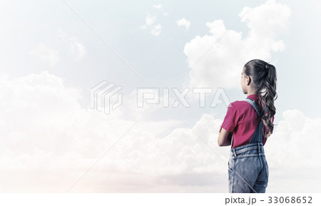 Concept of careless happy childhood with girl looking in future 33068652