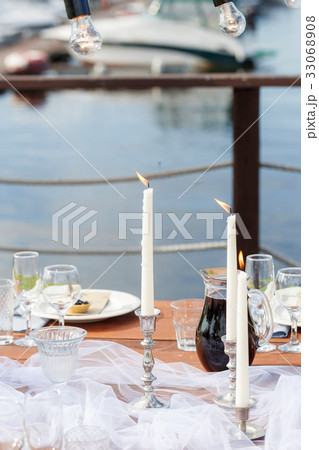 Glasses on the festive table setting. Wedding 33068908