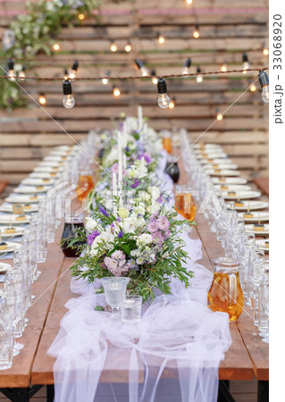 Glasses on the festive table setting. Wedding Glasses on the festive table setting. Wedding 33068920