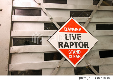 Warning sign of Live dinosaur inside big box 33071630