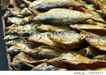 Smoked fish on the counter of the store Smoked fish on the counter of the store 33074372
