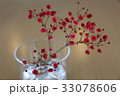 コップに刺さった南天 33078606