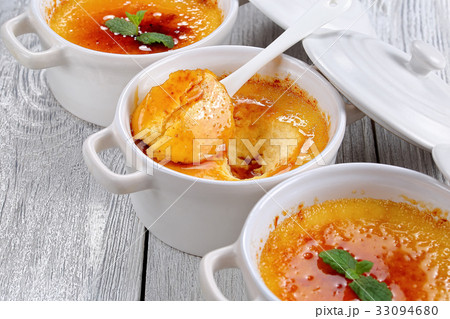 tasty Creme brulee, classic catalana dessert tasty Creme brulee, classic catalana dessert 33094680