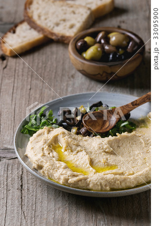 Hummus with olives and herbs Hummus with olives and herbs 33095900