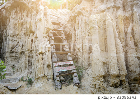 Wood stair in cave with sunlight. Wood stair in cave with sunlight. 33096343