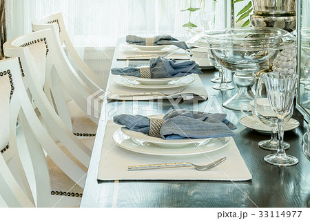 elegant table set in classic style dining room 33114977