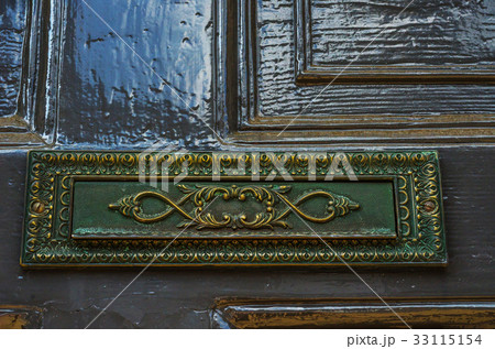 Old letterbox in the door 33115154