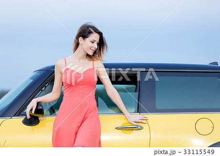 adult girl near car 33115549