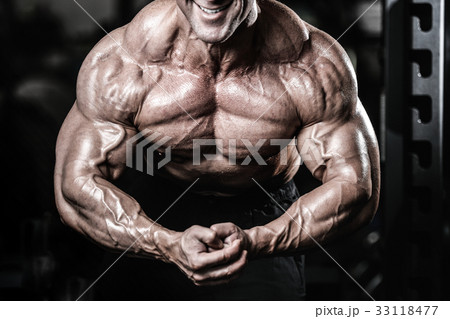 Brutal caucasian handsome fitness men on diet training chest pum 33118477