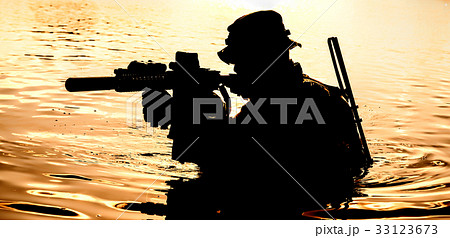 Crossing river in jungle 33123673