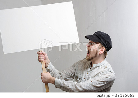 Angry protesting worker with blank protest sign Angry protesting worker with blank protest sign 33125065