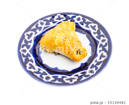 Traditional uzbek samsa bun with minced lamb. Traditional uzbek samsa bun with minced lamb. 33130481