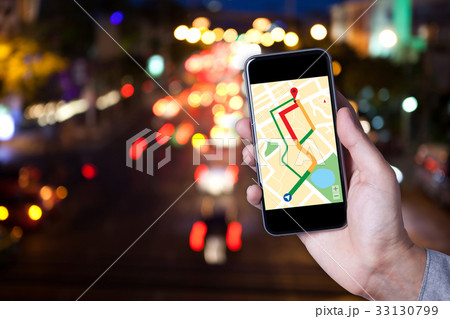 Hand of man using map on smartphone application Hand of man using map on smartphone application 33130799