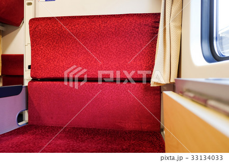 Closeup empty red seat in Chiang Mai express train 33134033