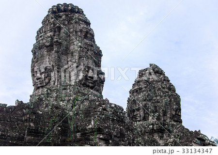 Bayon with smiling stone faces in Cambodia Bayon with smiling stone faces in Cambodia 33134347