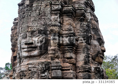 Bayon with smiling stone faces in Cambodia Bayon with smiling stone faces in Cambodia 33134365