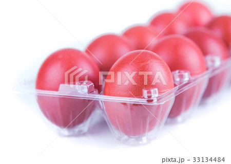 Tray of red color eggs for festive greetings gift Tray of red color eggs for festive greetings gift 33134484