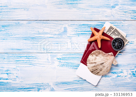Travel objects on blue wooden background Travel objects on blue wooden background 33136953